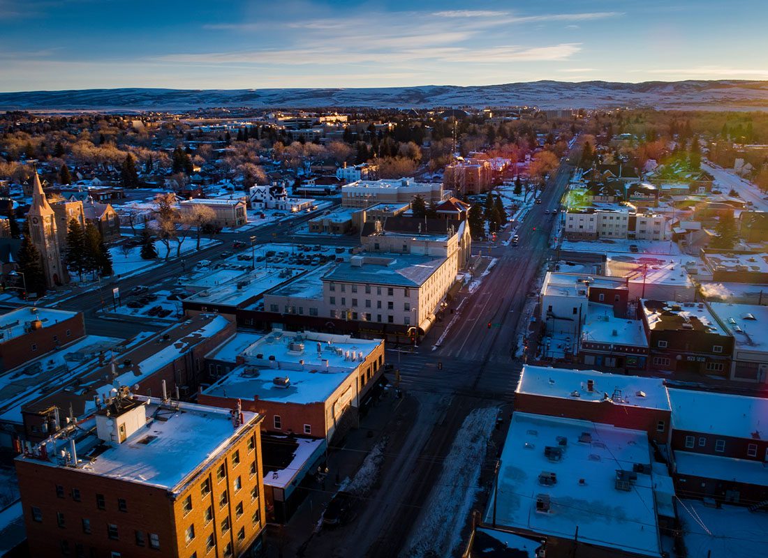 Evanston, WY - Landscape View of Morning Sunrise Aerial Of Downtown in Wyoming in the Winter With Fresh Snow