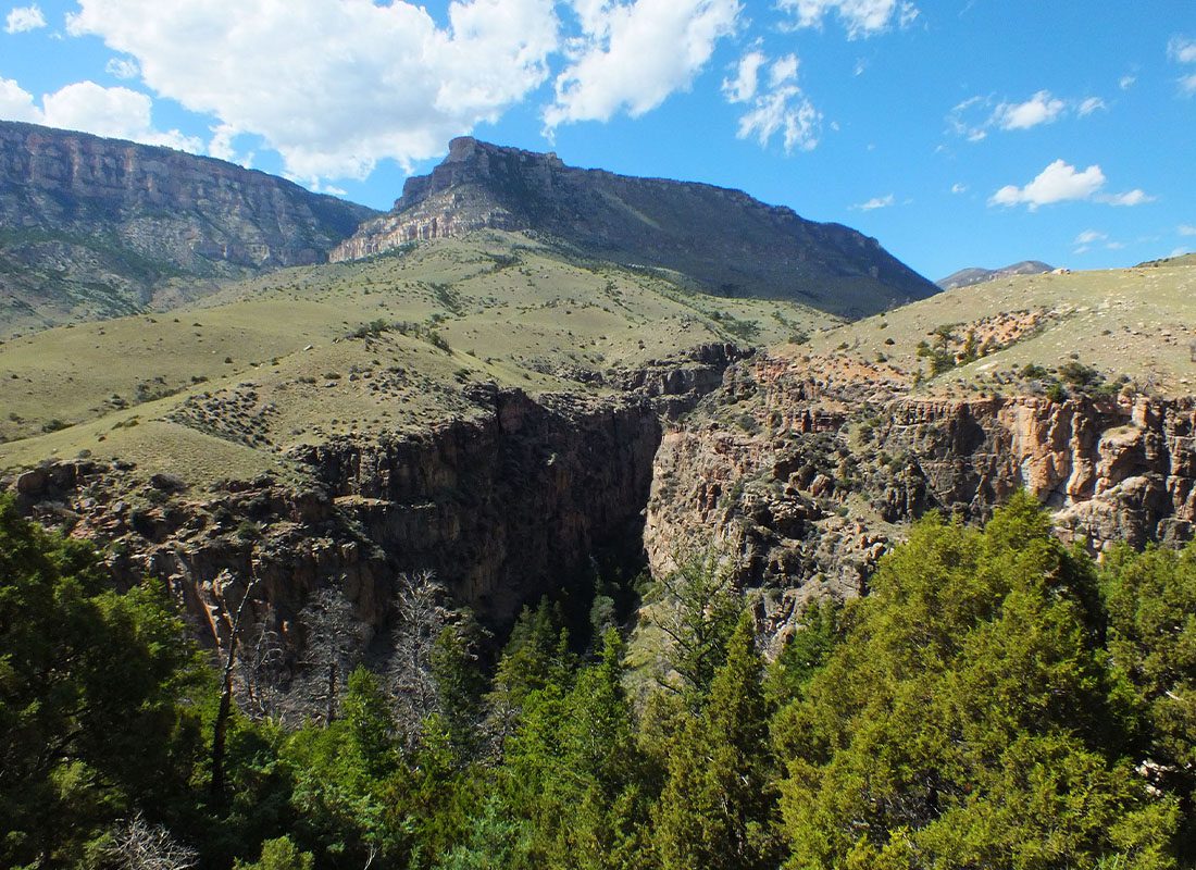 Sheridan, WY - Landscape View of the Bighorn Mountains in Wyoming on a Sunny Day